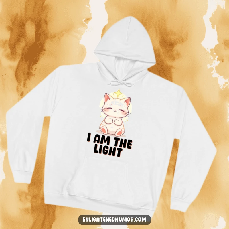 Funny celestial cat hoodie with an enlightened cat basking in a soft, ethereal light, offering cosmic warmth and serene style.