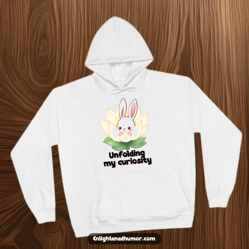 Funny hoodie featuring a curious bunny peeking from behind a glowing lotus flower, perfect for cozy moments and peaceful contemplation.
