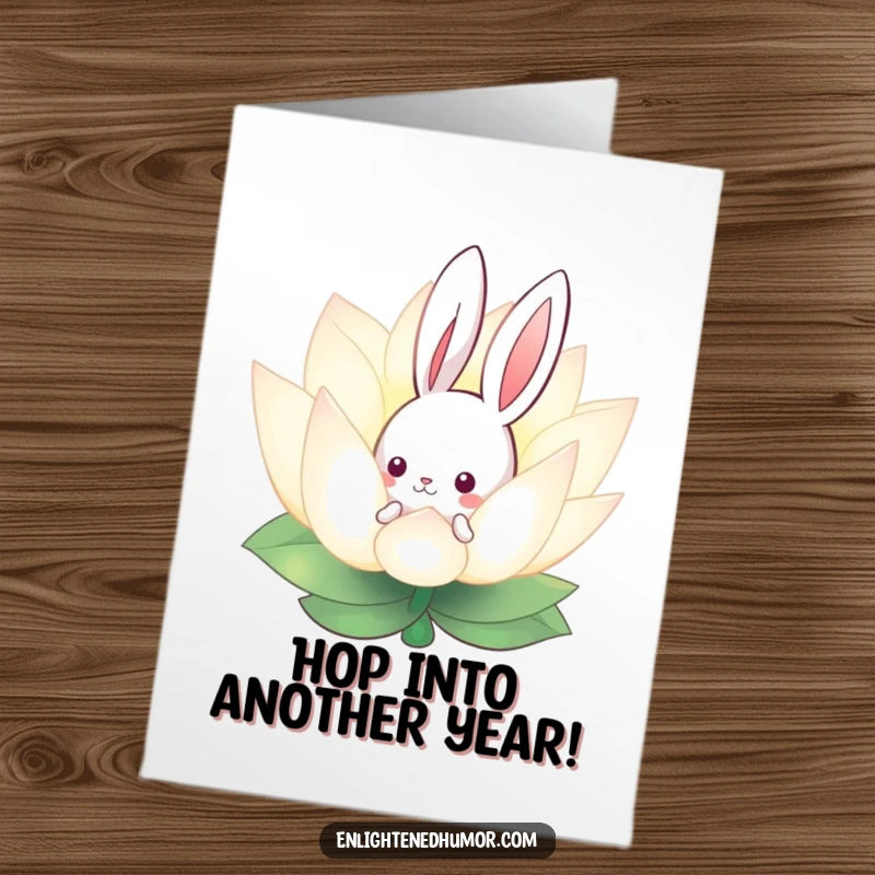 Free printable birthday card featuring a curious bunny peeking from behind a glowing lotus flower, adding a serene touch.