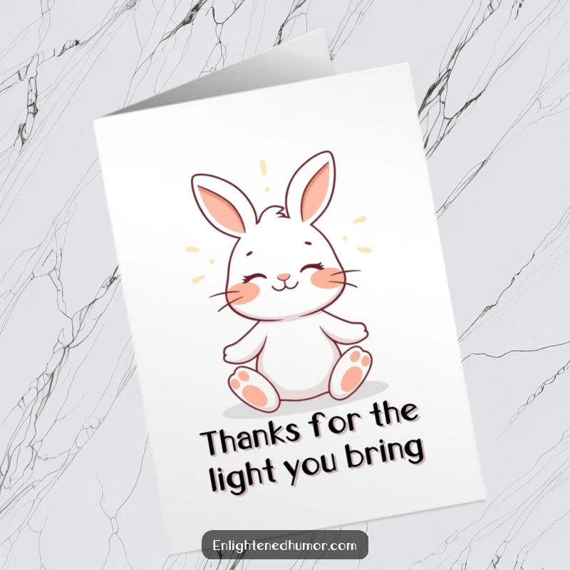 Funny free printable thank you card, a smiling rabbit in meditation, surrounded by a soft halo of light, expressing calm thanks.