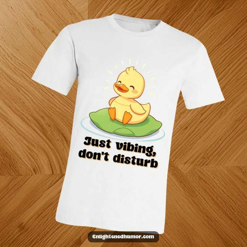 Funny Content Duck T-Shirt: Content duck floats on a lily pad, radiating gentle light. Perfect funny gift for serene and humorous souls.