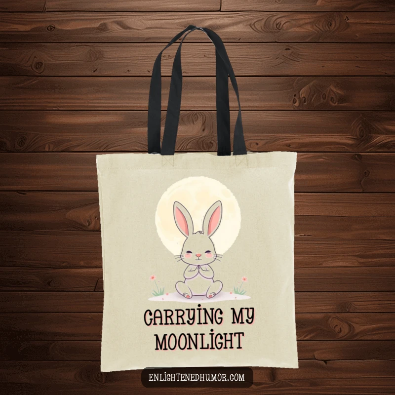 Funny tote bag with a determined rabbit meditating beneath a giant, serene moon, symbolizing humorous tranquility.