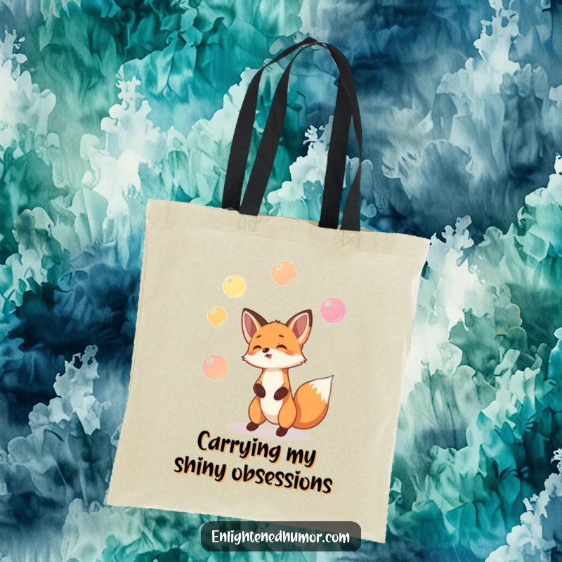 Funny tote bag with a playful fox juggling three tiny, glowing orbs, symbolizing humorous multitasking and magic.