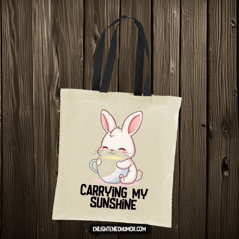 Funny tote bag featuring a contented bunny sipping from a glowing cup, designed for carrying essentials with warmth and style.