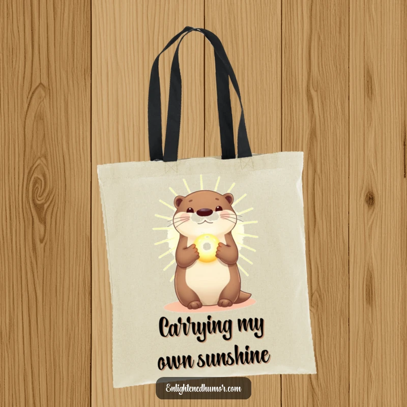 Funny Otter Tote Bag: A radiant otter holding a glowing orb in golden light, showcasing a magical, serene vibe.